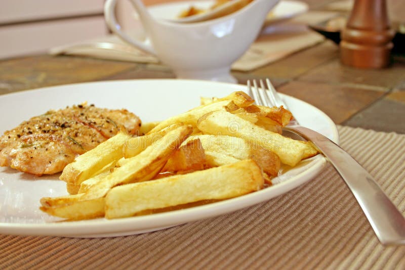 Salmon and herbs with homemade french fries. Crispy diet stock images, royalty-free photos and pictures