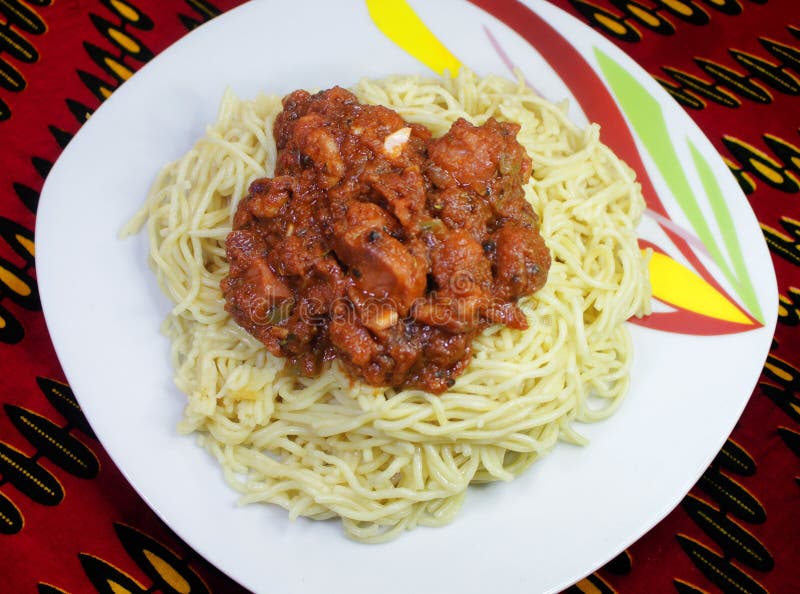 A meal of Spaghetti with Red Meat Sauce or gravy from top view