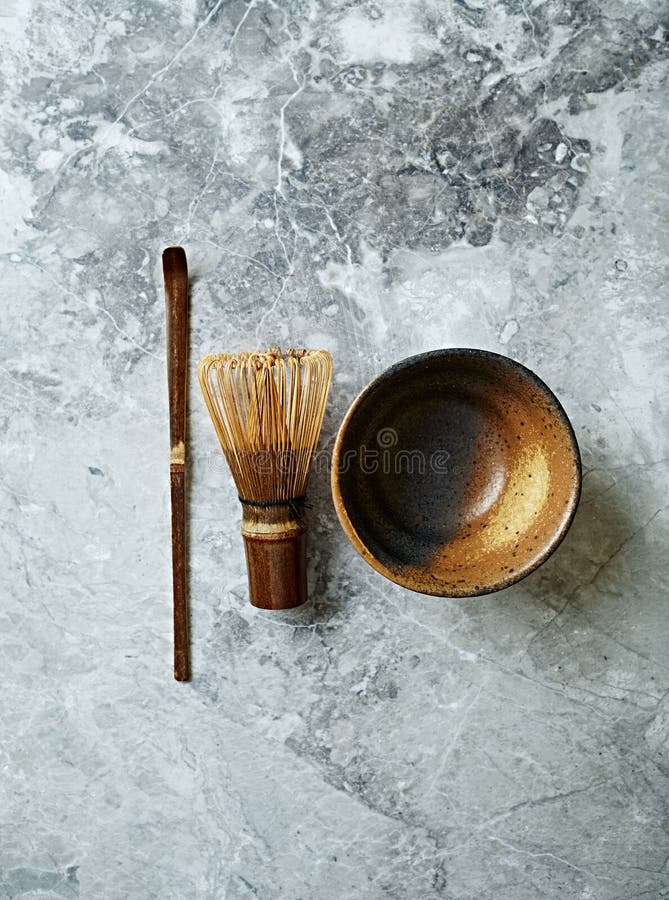 Measure spoon, bamboo whisk and ceramic cup for matcha tea