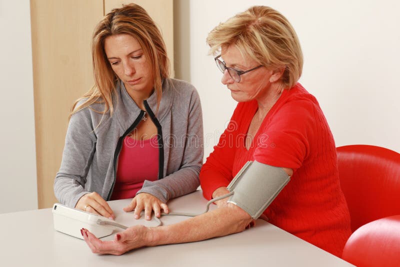 Measuring the Blood Pressure with a Blood Pressure Gauge Stock Image