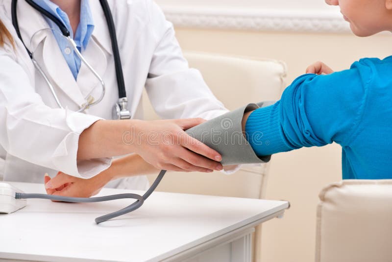 Measuring blood pressure royalty free stock image