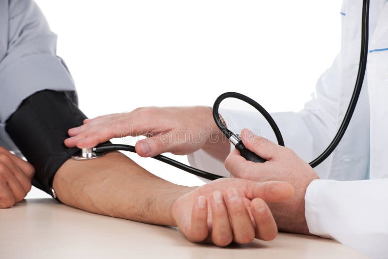 Measuring blood pressure. stock photos
