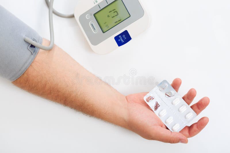 Measuring blood pressure stock image. Image of hypertension 57065327