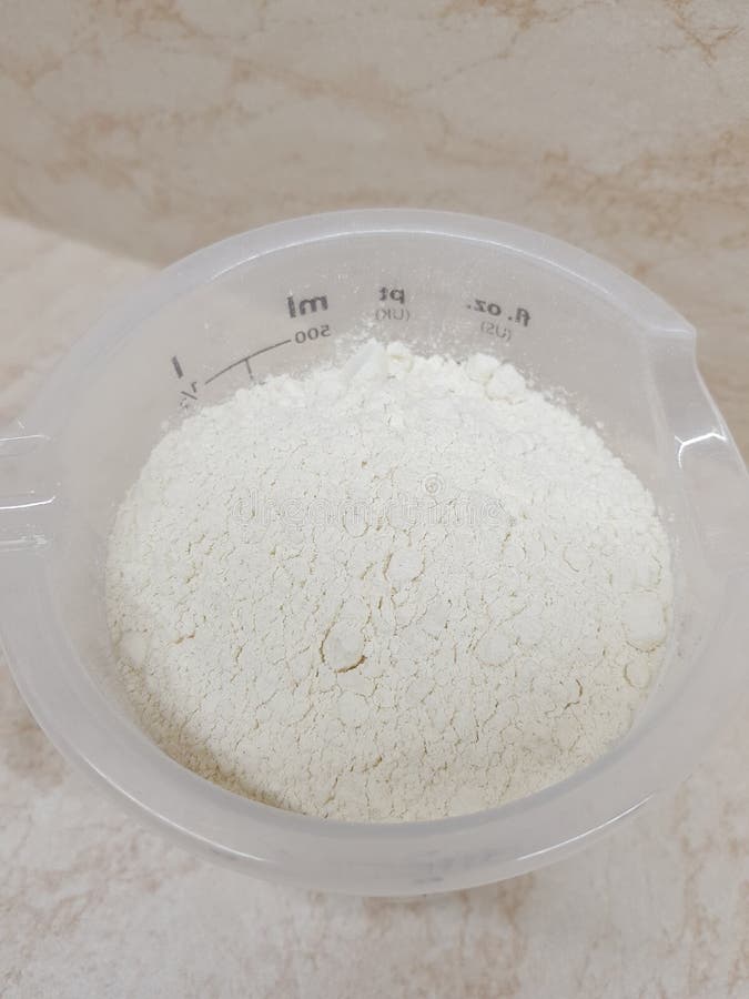 Measuring Cup with Flour stock image. Image of flour 10654981