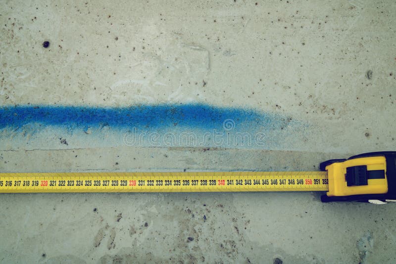 Measuring Ruler on a Concrete Wall Texture Stock Image Image of grimy