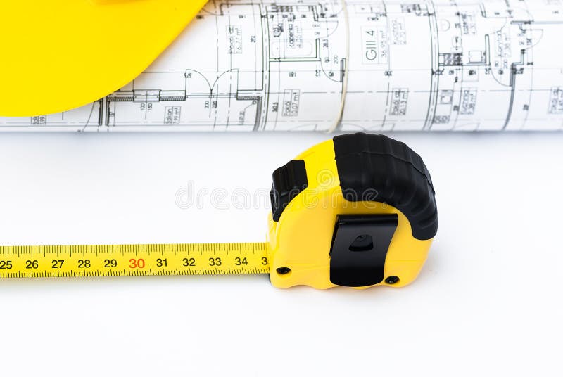 Measuring tool and architect`s plans