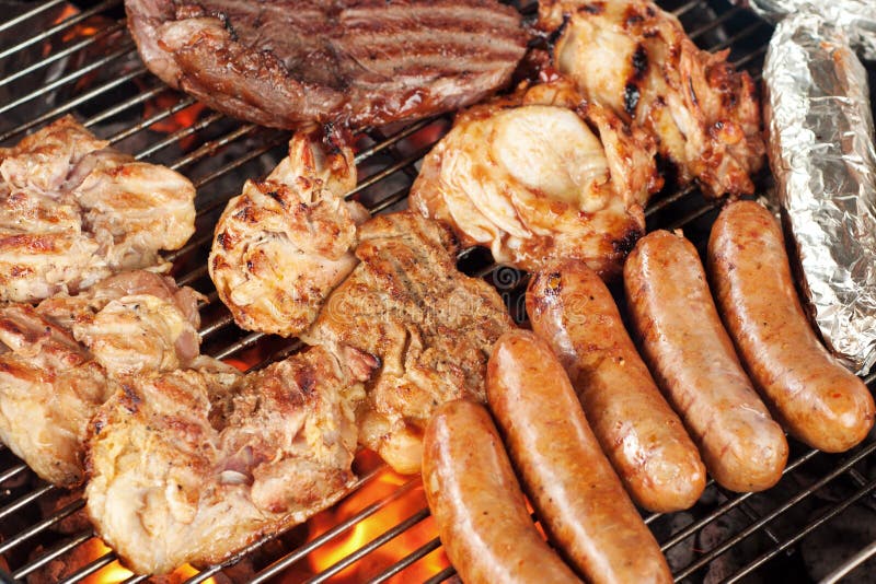 Meat on the barbecue grill stock image. Image of grill 25012791