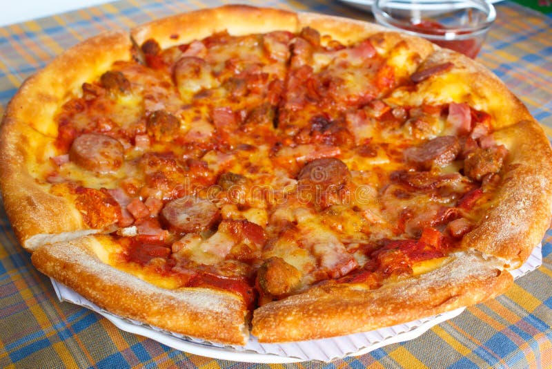 Meat deluxe pizza. stock photo. Image of portion, pepperoni 38459772