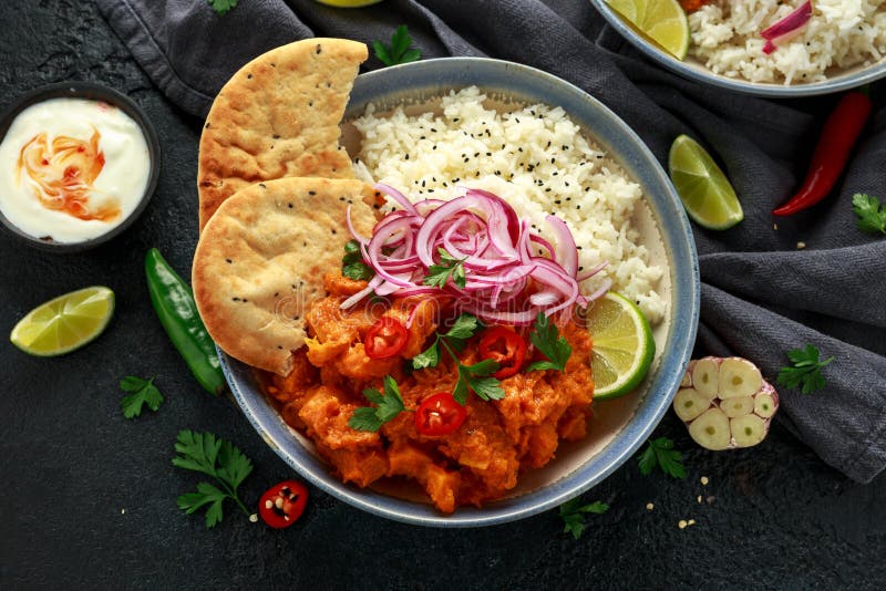 Meat free butternut squash curry with jasmine rice, pickled onions and naan bread.