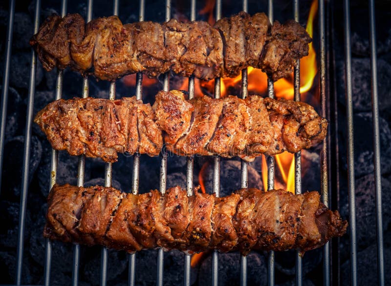 Meat on grill stock photo. Image of dinner, delicious 195413428