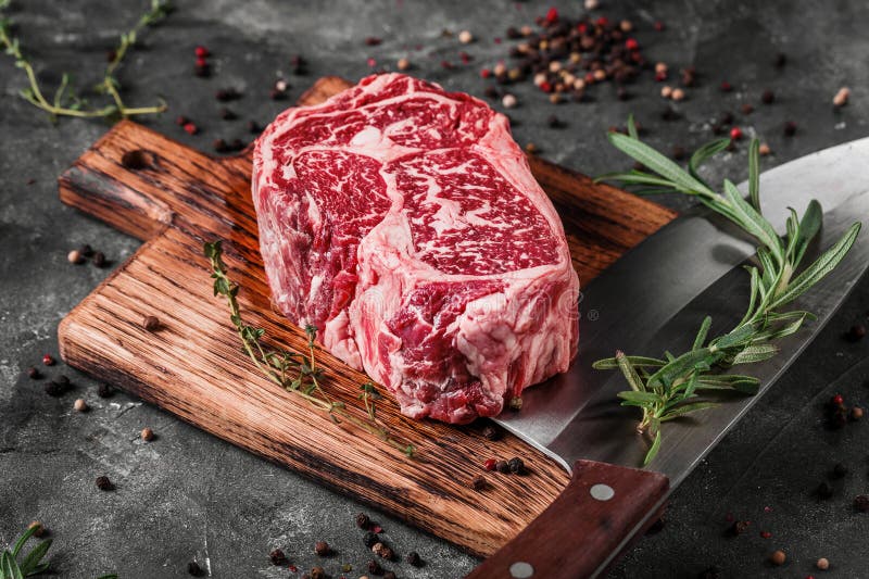 Meat Processing Plant. Carcasses of Beef Hang on Hooks Stock Image ...