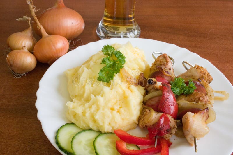 Meat skewer with mashed potatoes. Roasted skewer grill stock images, royalty-free photos and pictures