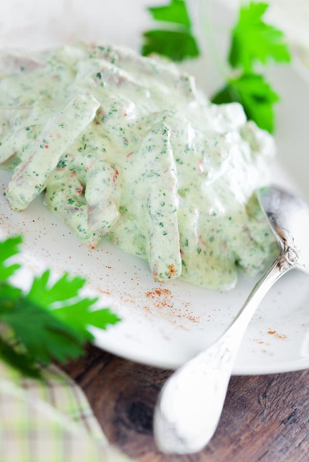 Meat in spicy yogurt sauce stock photo. Image of chilli 25664900