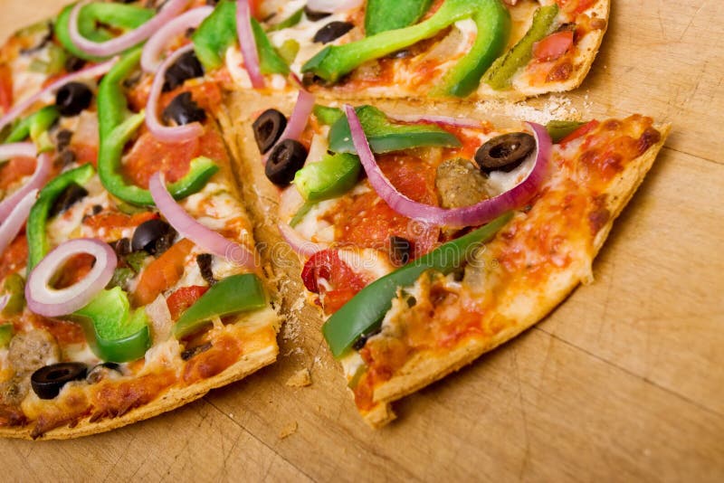 Meat and vegetable pizza royalty free stock photography
