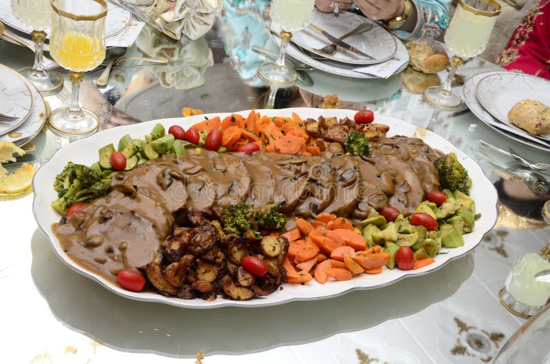 Meat with Vegetables and Barbecue Sauce. Meat Strip Dish Stock Photo