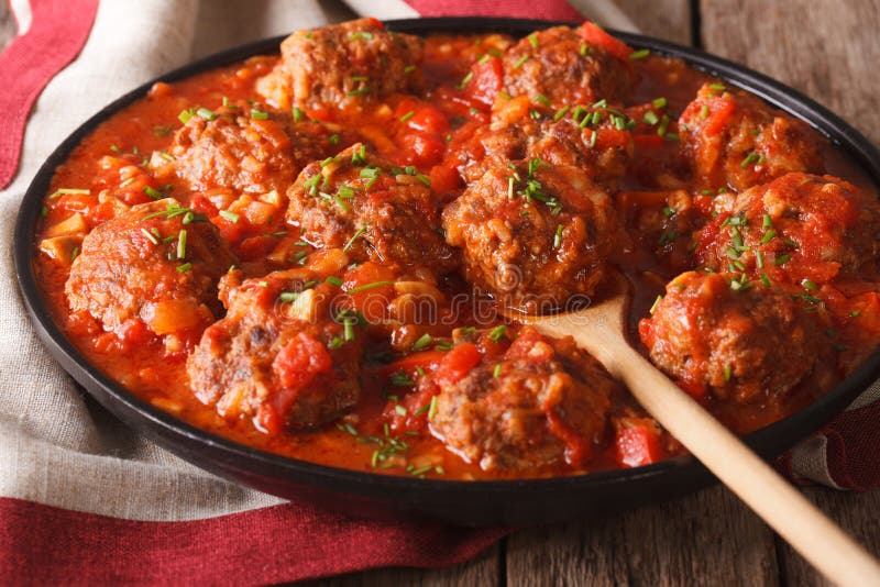 Meatballs with Spicy Tomato Sauce on a Dish Closeup. Horizontal Stock
