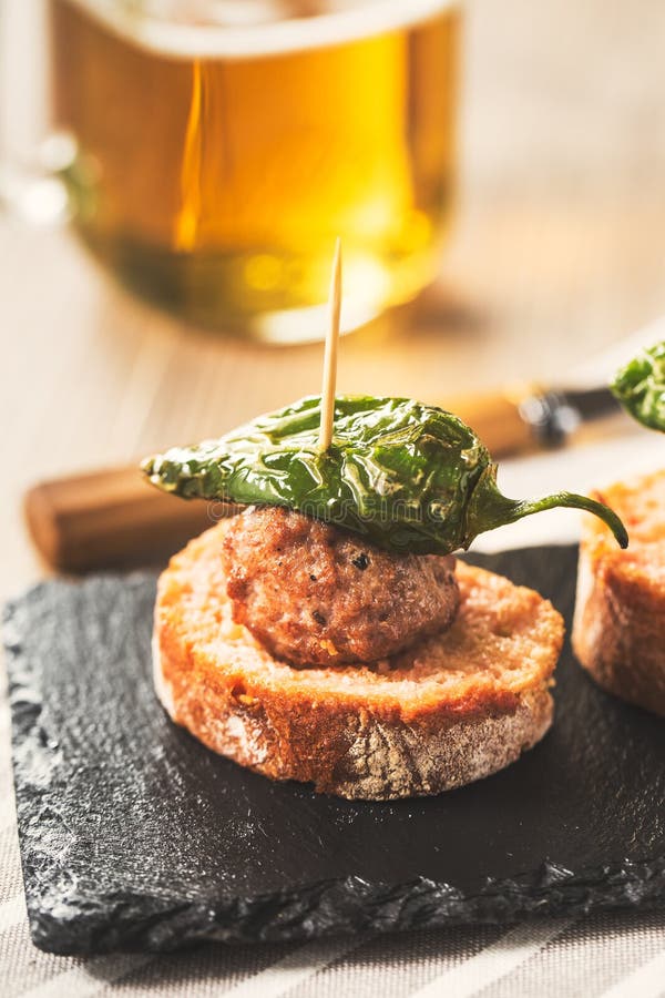 Meatballs tapas stock image. Image of slate, bread, meatball 59834433