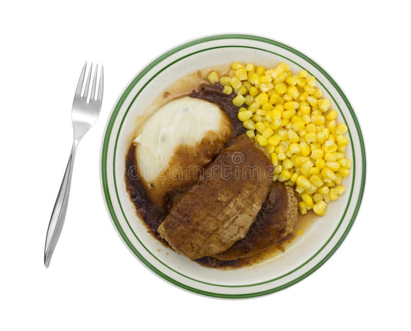 Meatloaf with Gravy Potatoes and Corn TV Dinner on Plate Stock Photo