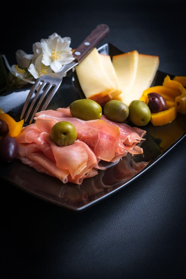 Platter of Prosciutto, Cheese and Olives Stock Photo Image of