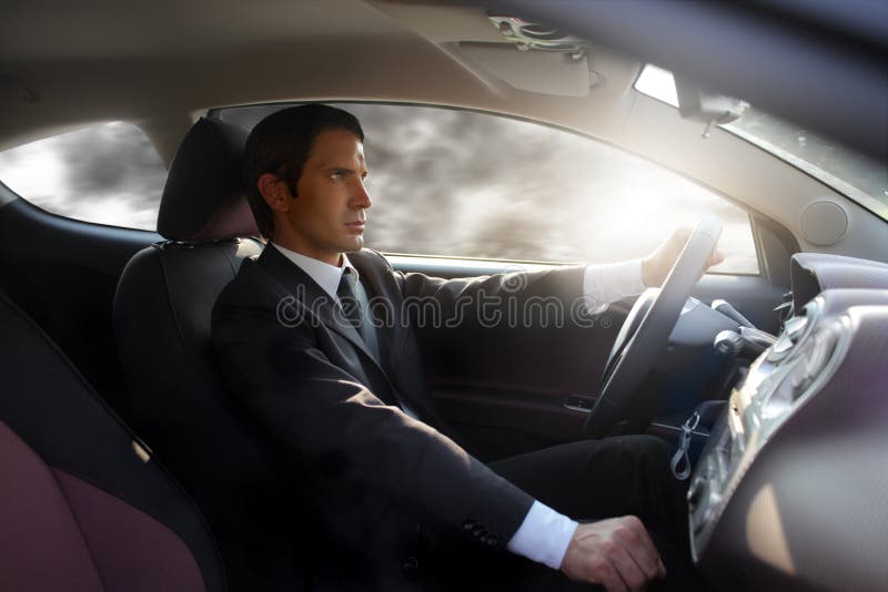 Business man driving sport car. Business man driving sport car