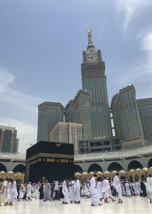 MECCA, SAUDI ARABIA-CIRCA MAY 2019 :Abraj Al Bait Royal Clock Tower Makkah in Makkah, Saudi Arabia while Muslim pilgrims