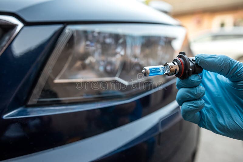 Mechanic Changing Car Light Bulb Against Headlight Stock Image Image