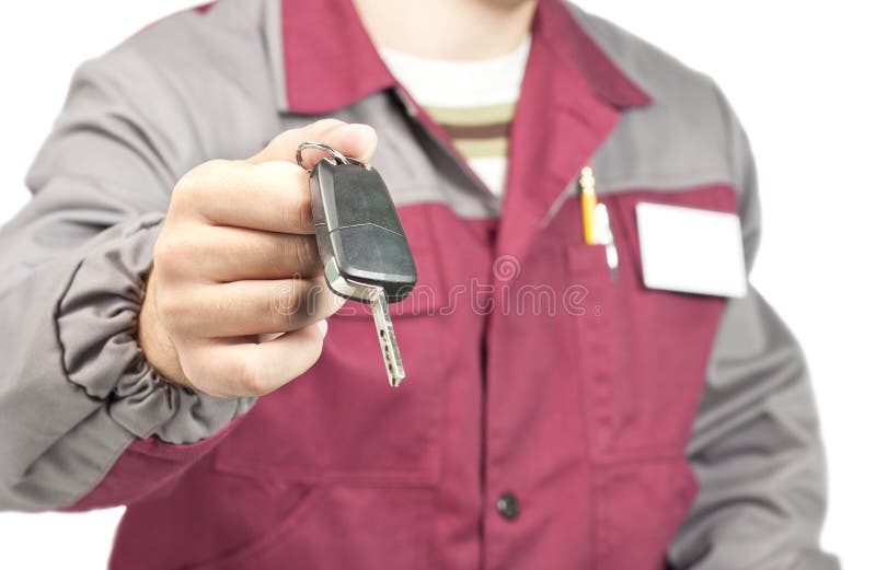 Mechanic giving a car key