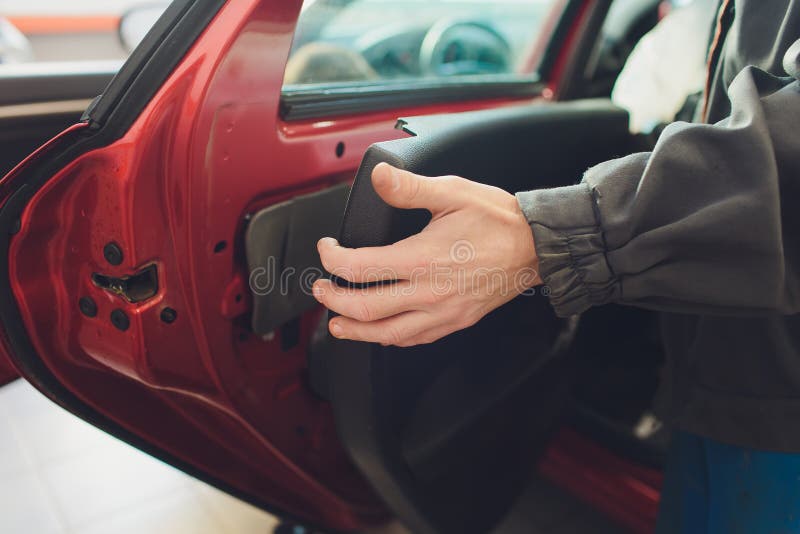 Mechanic Installing Car Central Door Lock Motor. Stock Image Image of