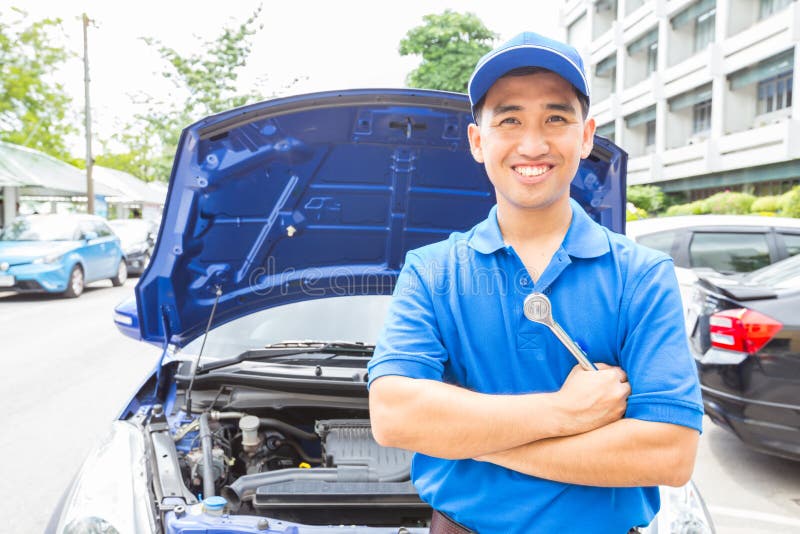Mechanic man with tool for repair car. Auto repair service royalty free stock photos Mechanic man with tool for repair car. Auto repair service royalty free stock photos