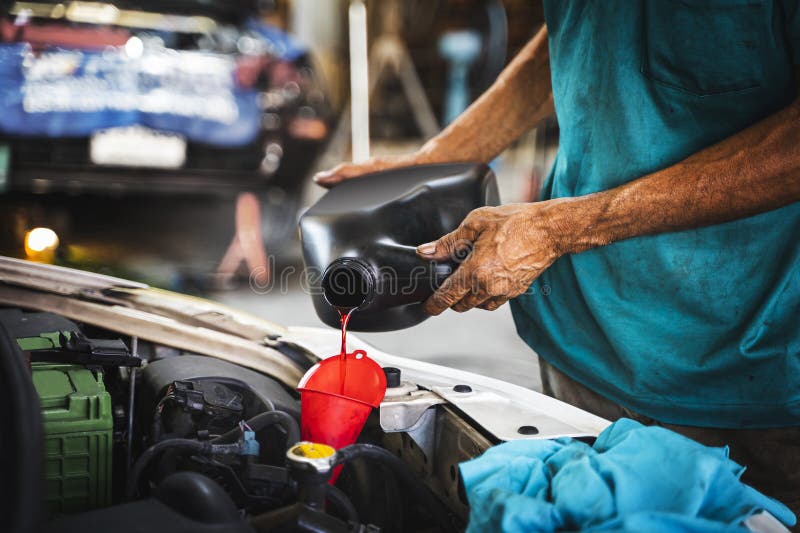 Mechanic Pouring Oil into Car Engine Stock Image Image of engine