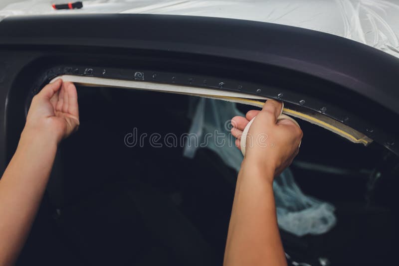 Mechanic Preparing a Car for Painting by Protecting the Edges. Stock Image Image of mask, hand