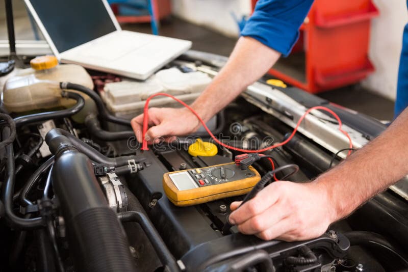 Mechanic Using Diagnostic Tool on Engine Stock Image - Image of ...