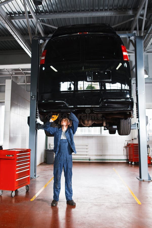 Mechanic Working with Car Suspension System Stock Photo Image of