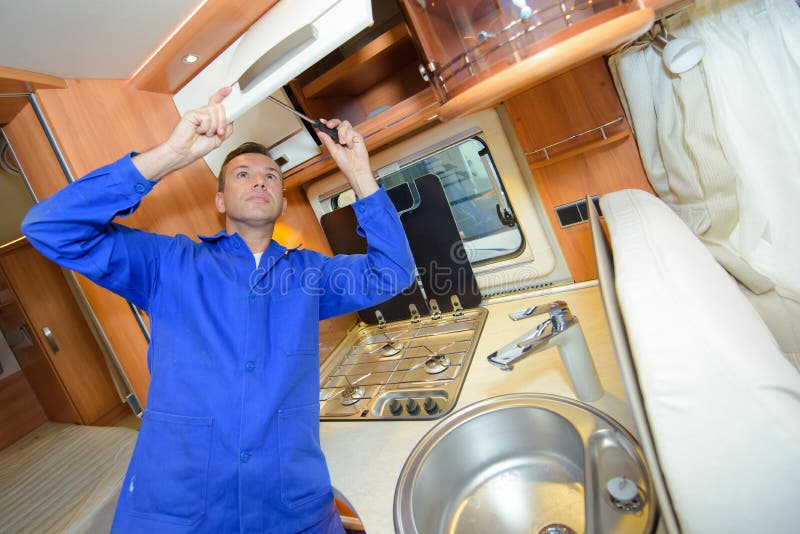 Mechanic Working on Interior Camper Van Stock Photo Image of male, travel 83014546