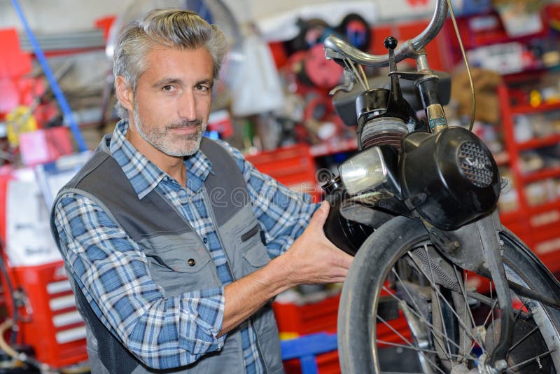 Mechanic Workng on Motorcycle Stock Image Image of repair, mechanic