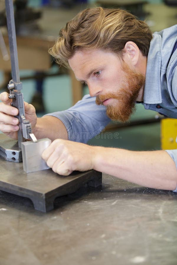 Mechanical Technician Measuring with Caliper Stock Image Image of