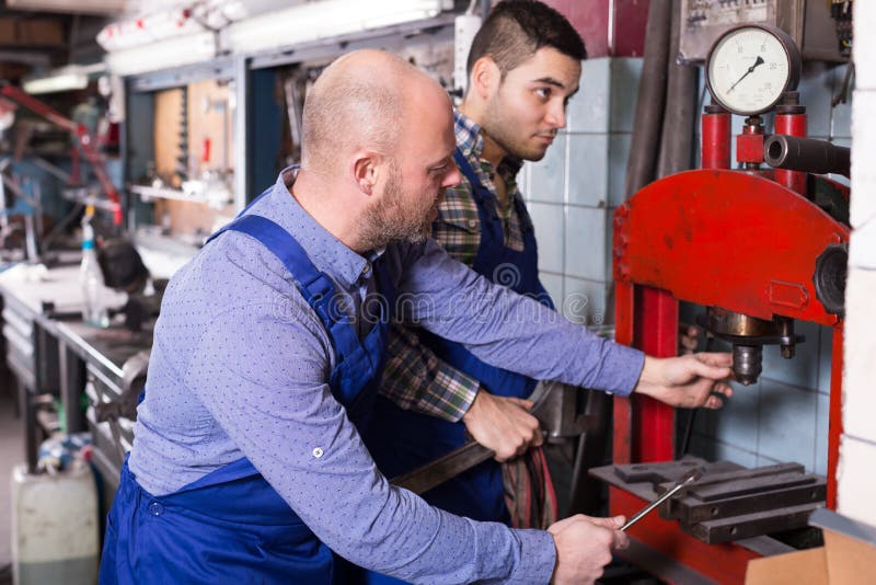 Mechanics Working at Stock Image Image of machinery, fixing