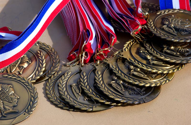 Medals from triathlon with ribbons. Medals from triathlon with ribbons