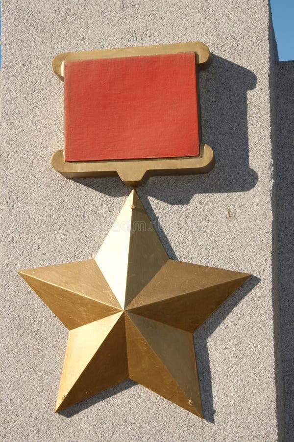 Medal Gold Star Hero of the Soviet Union on a pedestal in Petrozavodsk, Russia.