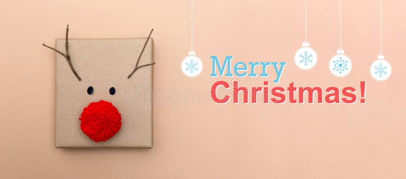 Meddelande för glad jul med en rengåvaask arkivfoto Meddelande för glad jul med en rengåvaask arkivfoto