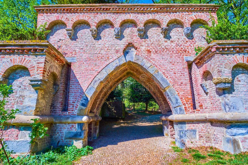 The medeival brick arched Neo-Gothic portal in Monza Royal Gardens (Giardini Reali di Monza), Italy