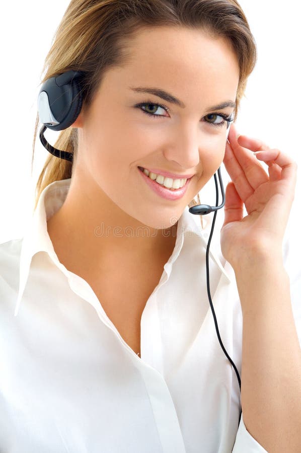 Young assistant with headphones smiling. Young assistant with headphones smiling