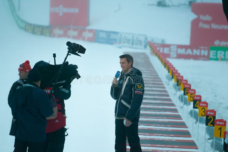 12/16/2012 Pokljuka, Slovenia. German sports commentator Christian Dexne commenting live for station ARD from the biathlon world cup race in Slovenian Pokljuka. 12/16/2012 Pokljuka, Slovenia. German sports commentator Christian Dexne commenting live for station ARD from the biathlon world cup race in Slovenian Pokljuka.