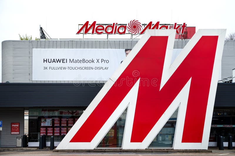 Ghent, Flanders, Belgium - 02 20 2021: The Mediamarkt and Delhaize retail  shops and parking Stock Photo - Alamy