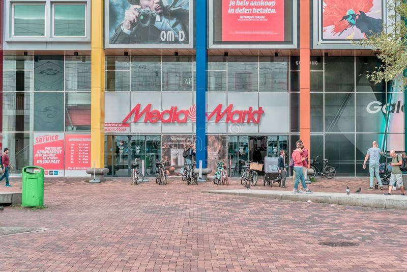 Brussels Old Town - Belgium - People Walking Along the Mediamarkt  Electronics Concern in the Rue Neuve, the Main Shopping Street Editorial  Stock Photo - Image of logo, area: 243000343