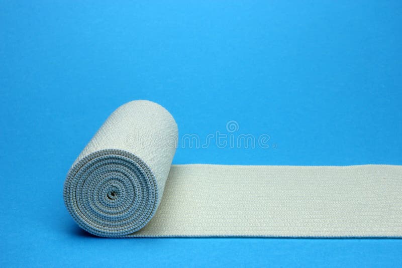 Medical Bandage Roll on a Blue Background Stock Photo Image of