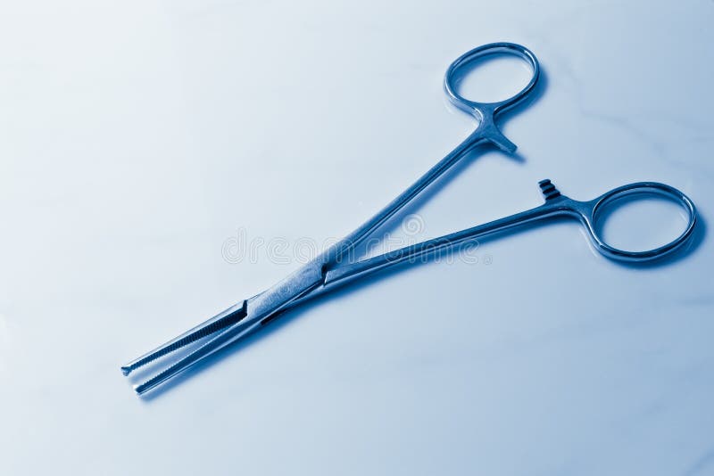 Medical clamp instruments stock image. Image of metal 12463505