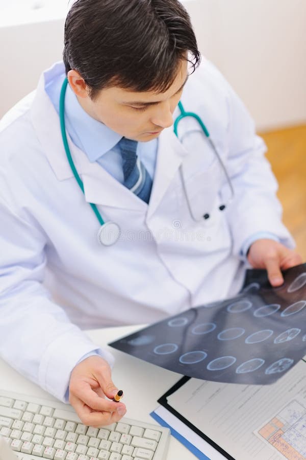 Medical doctor examine mri. Top view stock images