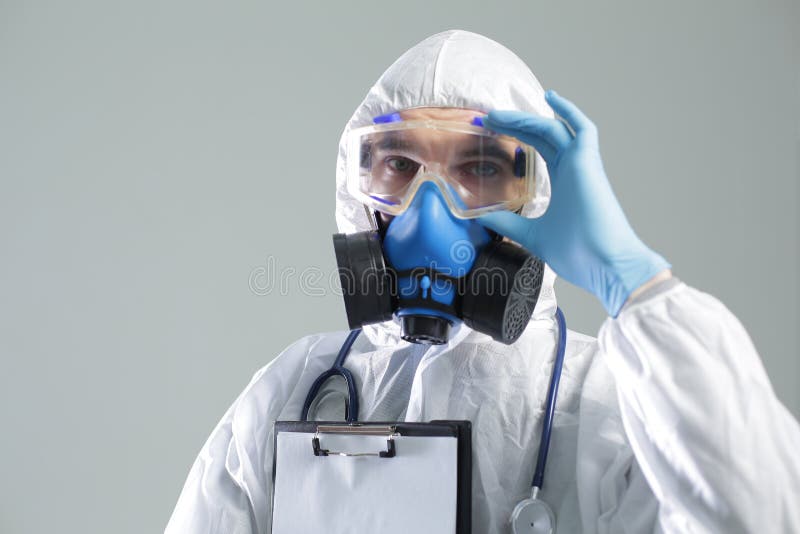 Medical Doctor with Protection Mask, Glasses and Suit with Stethoscope ...