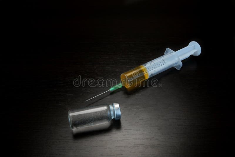 Medical Injection Syringe With Liquid And Transparent Ampule